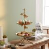 WhatsApp Image 2025-12-30 at 4.50.05 PM Premium Two-Tier Cake Stand in Stainless Steel with Antique Brass Finish – Floral & Bird Design Dessert / Cupcake / Serving Stand