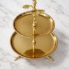 WhatsApp Image 2025-12-30 at 5.06.13 PM Premium Two-Tier Cake Stand in Stainless Steel with Antique Brass Finish – Floral & Bird Design Dessert / Cupcake / Serving Stand